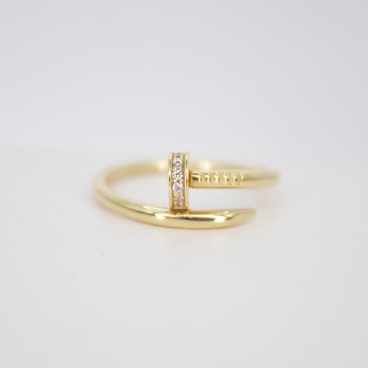 Anillo tornillo en oro amarillo 14k con zirconias.