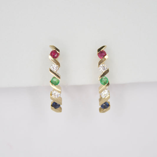 Aretes en oro amarillo 14k con rubí,diamantes,esmeralda y zafiros.