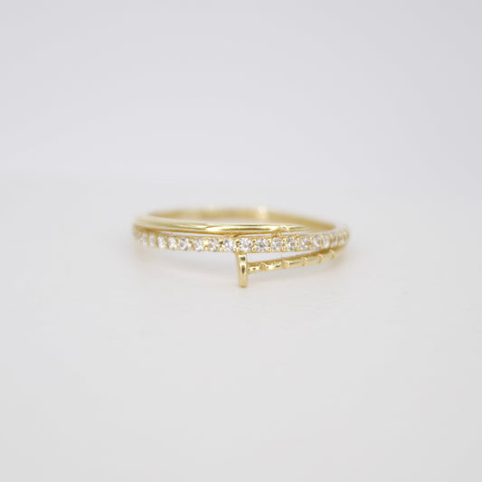 Anillo tornillo en oro amarillo con zirconias.