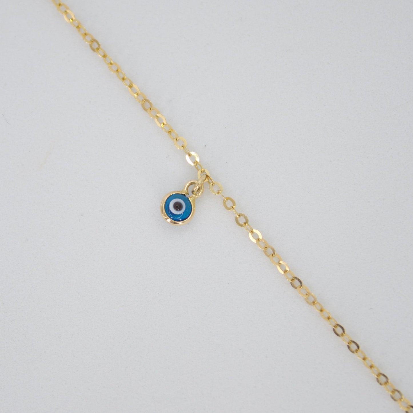 Pulsera ojo turcos en oro amarillo 14k.