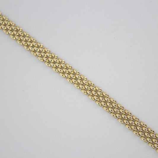 Pulsera tejido pantera en oro amarillo 14k.