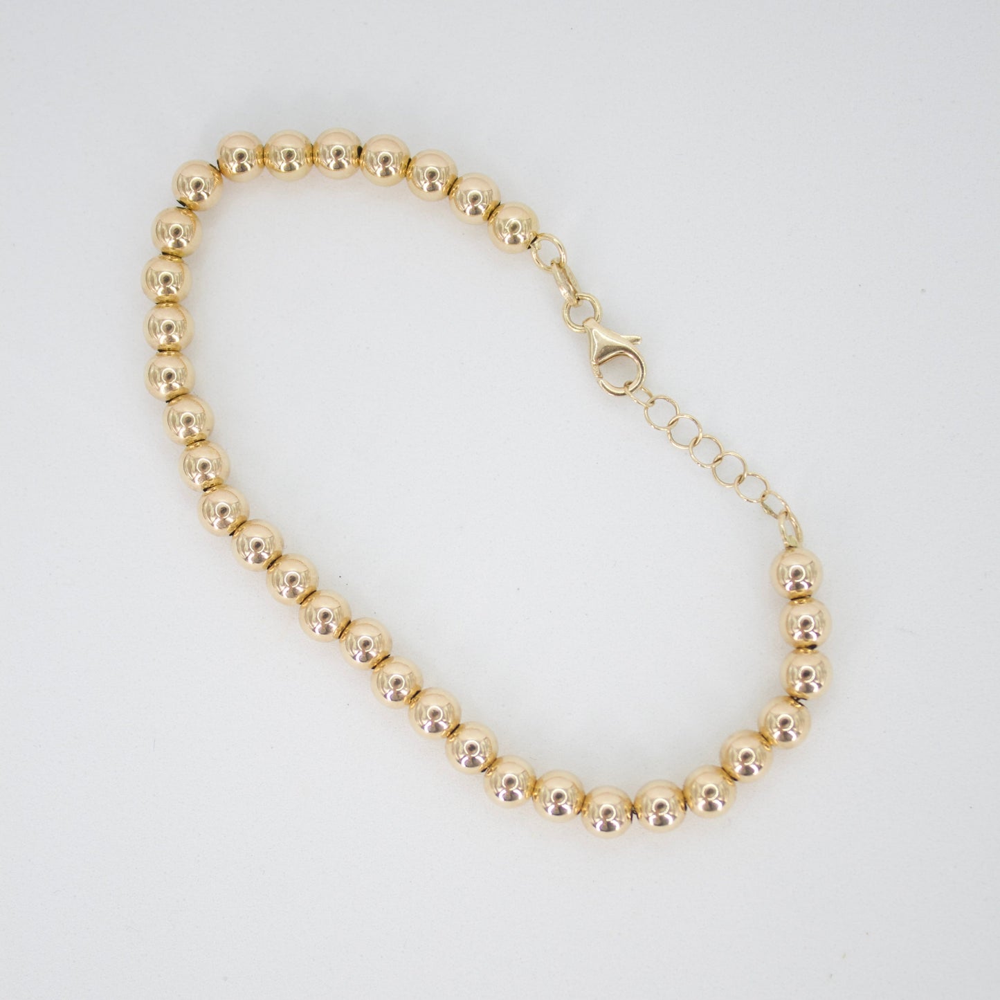 Pulsera de bolitas en oro amarillo 14k.