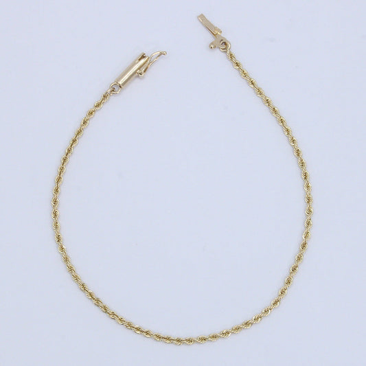 Pulso torsal en oro amarillo 14k.