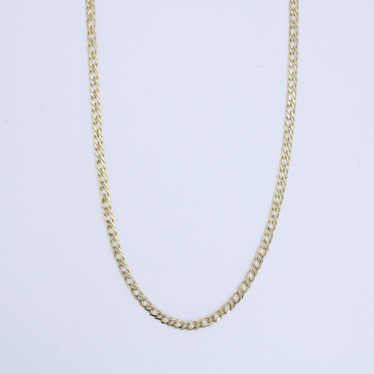 Cadena doble rombo en oro amarillo 14k.