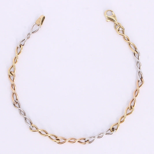 Pulsera torsal en oro florentino 14k.