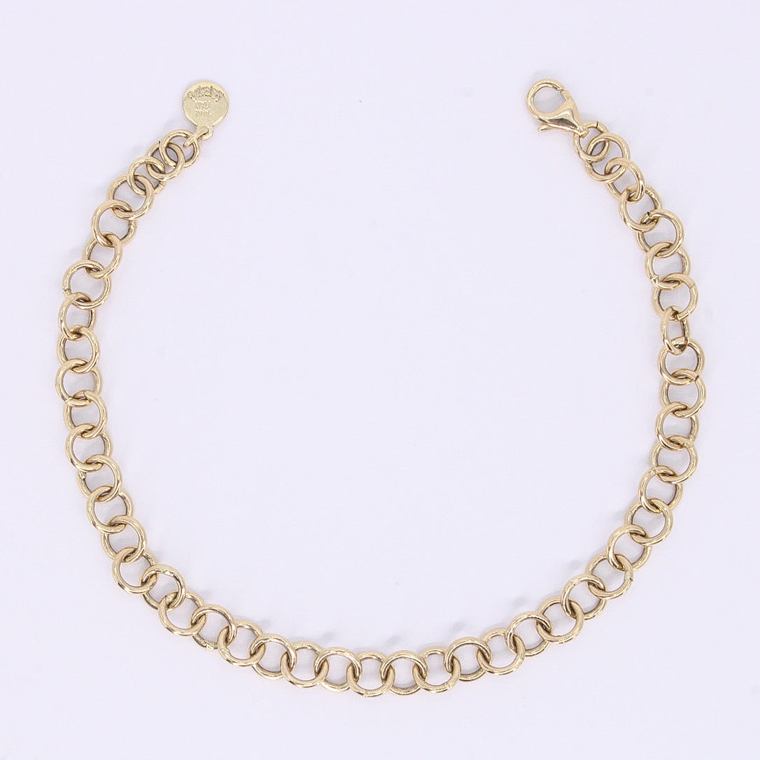 Pulsera aros en oro amarillo 14k.