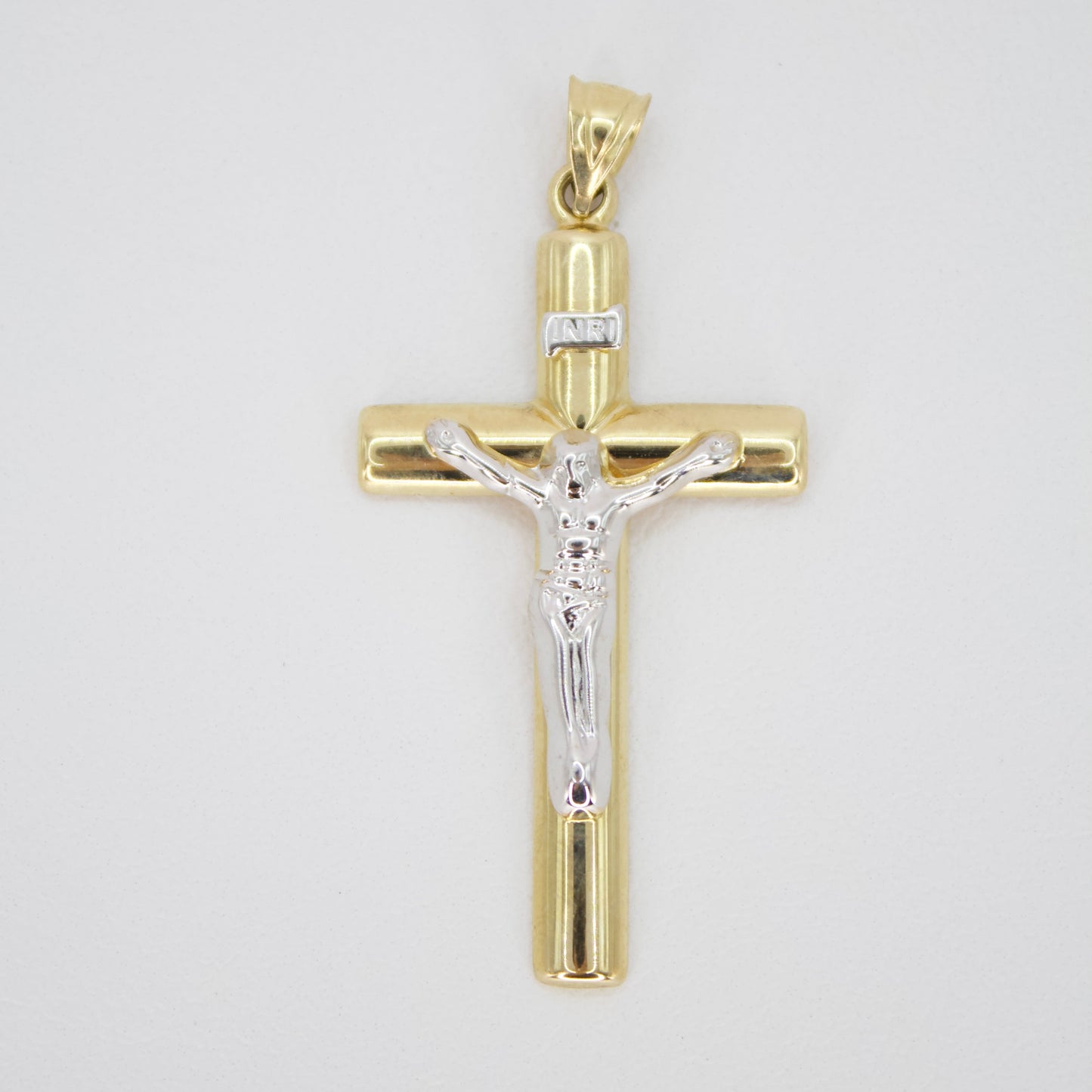 Cruz con Cristo en oro combinado 14k.