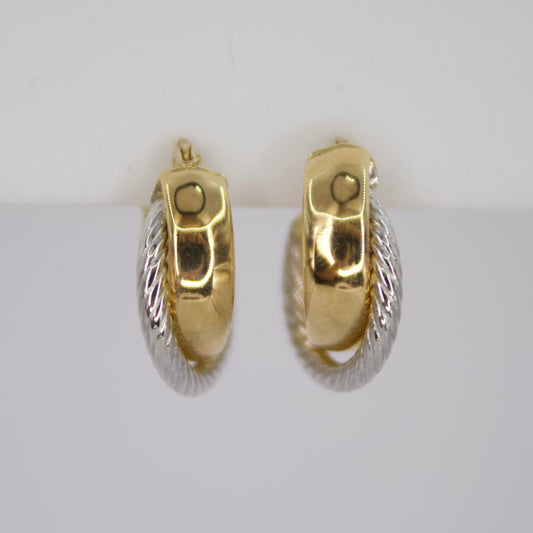 Aretes huggies en oro combinado 14k.