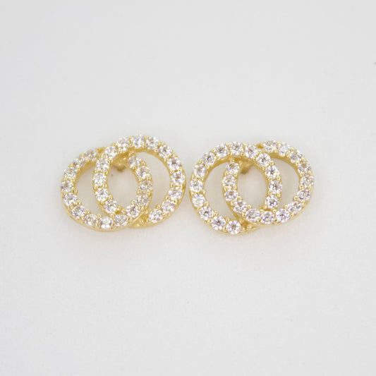 Aretes círculos en oro amarillo 14k con zirconias.